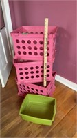 Three pink storage containers & small tub