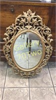 Large highly ornate gilded wall mirror 34" tall