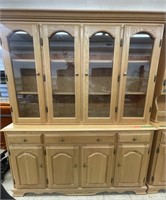 Two-piece china cabinet with four glass doors.