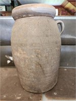 Large handled pottery jug with lid