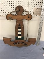 Wooden sailor welcome sign