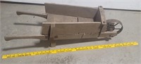 Older wooden mini wheelbarrow
