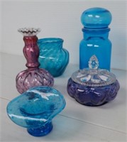 Assortment of blue glassware.