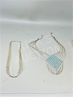 pair of sterling necklaces (long chains)