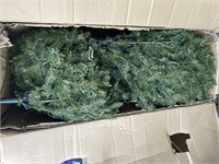 9 foot artificial pre-lit Christmas tree