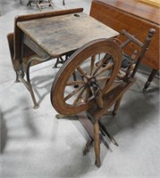Antique school desk and spinning wheel
