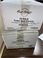 One open and one new box of toilet seat covers