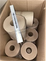 Open box of paper hand towel rolls