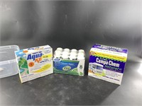 Cannisters of RV toilet chemical treatments