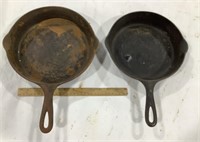 2 cast iron skillets