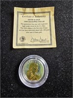 2000P Sacagawea Dollar - Silver & Gold in display