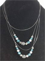 BLUE, CLEAR AND METALIC LUSTRE BEADED NECKLACE 22"