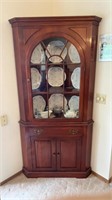 Willett cherry corner cabinet. Comes out 28