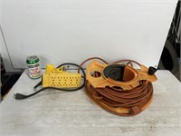 Extension cord with reel and power supply