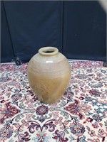 Tall beige clay vase