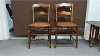 Pair of wood cane chairs