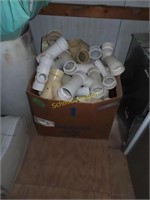 Miscellaneous PVC pipe, old printer, and