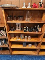 All the glass ware on the Shelving