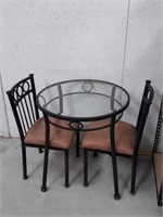 Glass table with two chairs 29.5 inches round