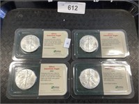 4 -2002 Silver American Eagles.