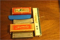 SIX ASSORTED HARMONICAS