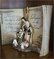 Maturity figurine with bible