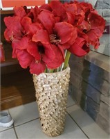 Sea shell vase and red flowers