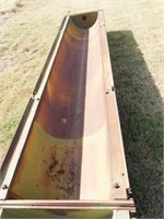 Steel feed bunk on skid, 33 ft