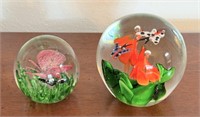 Two Glass Paperweights with Butterflies