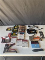 Assorted staple guns and staples