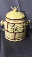Honey bee canister with meas spoons