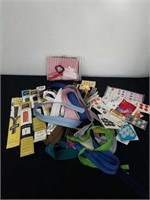 Group of scissors, buttons, snaps and fabric