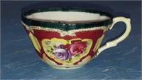 Antique fine porcelain hand painted tea cup