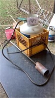 Weed burner with bottle and crate bottle has some