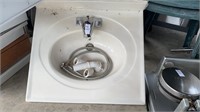 White bathroom sink 25x22
