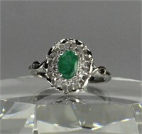 14 K EMERALD AND DIAMONDS RING