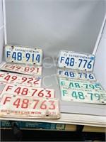 9 vintage Saskatchewan license plates