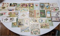 Large assortment of 1900 postcards best wishes