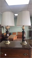 Pair of brass and wood table lamps.