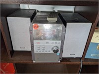 Panasonic CD player with 2 speakers (Main room)