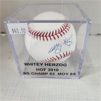 Signed Baseball in Case - Whitey Herzog