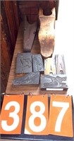 2 wooden boot jacks & carved wood print blocks