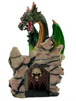 Green Guardian Dragon Perching Atop Rock Cave