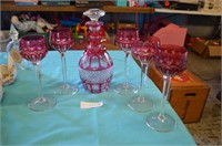 Cranberry Cut Glass Decanter and 5 Goblets