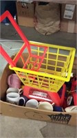 Childs grocery cart, coffee mugs, ladies hand