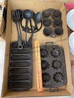 Box lot of cast iron, muffin, cornbread sticks,