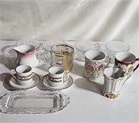 Coffee cups,creamer and butter dish