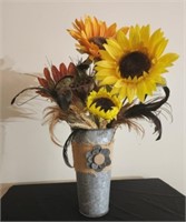 Metal vase with faux flowers