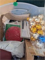 Large plastic storage tote with ornaments and