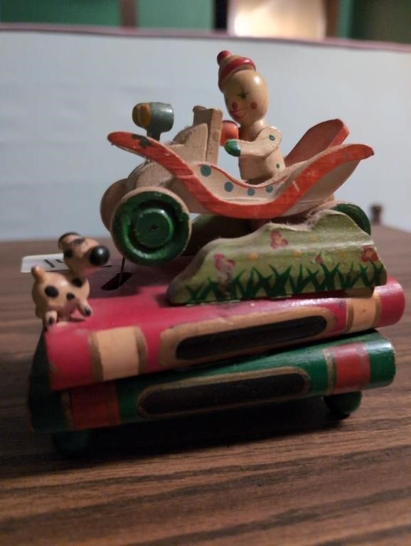 Vintage wood clown car on books music box